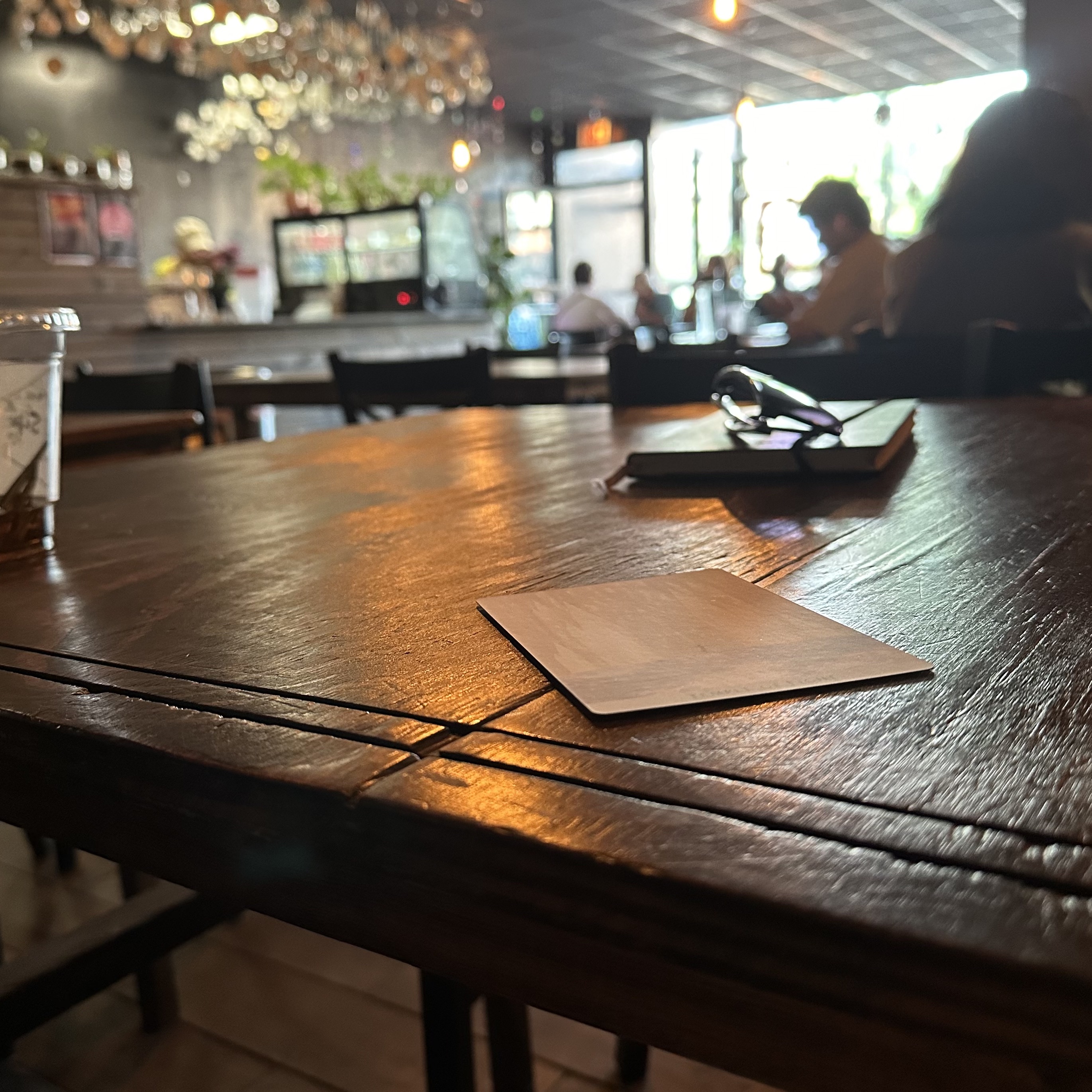 coffee shop vibes with an oracle card on the table.